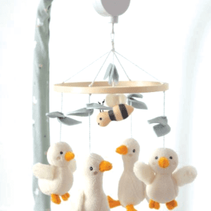 goosey goosey musical mobile hanging above crib