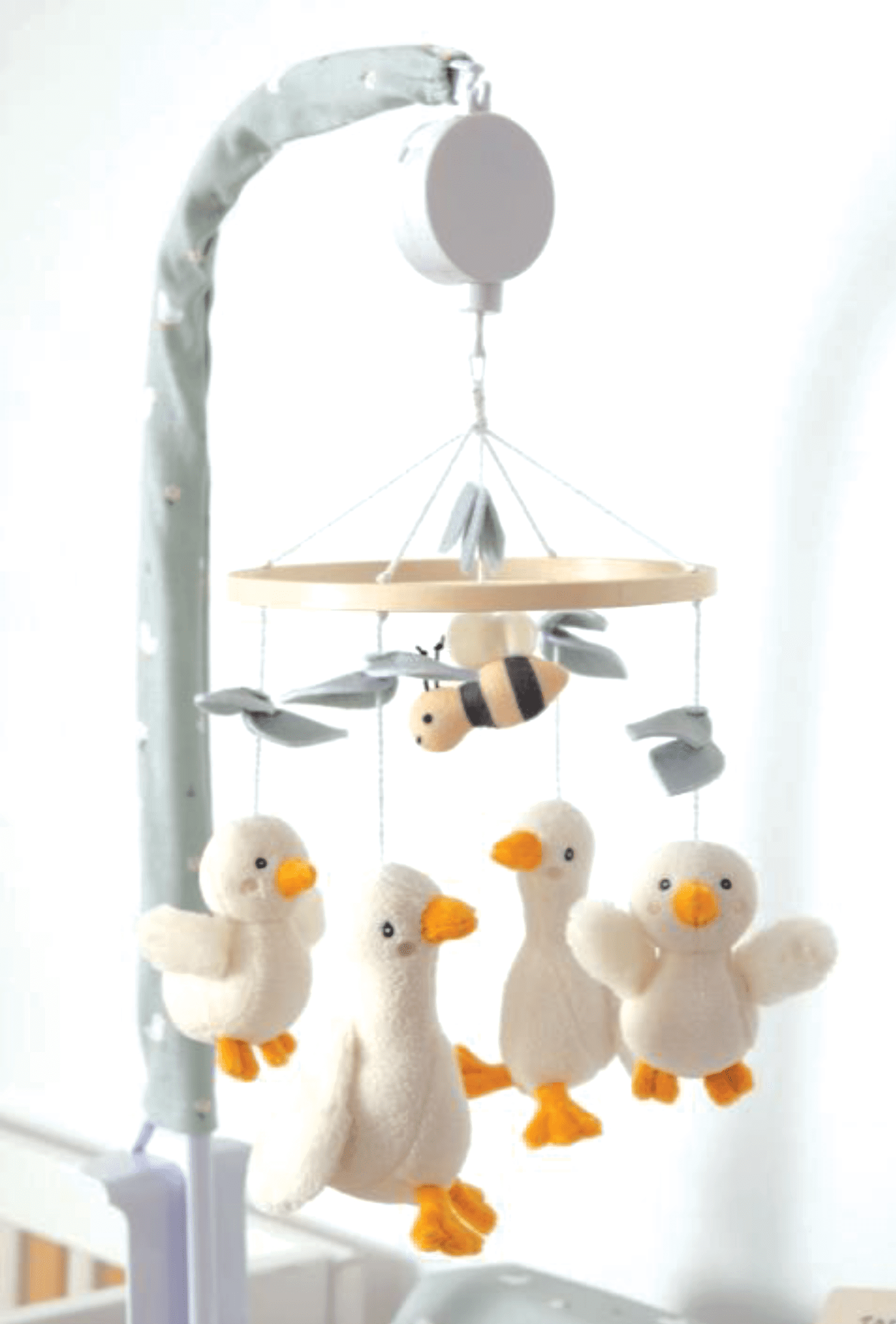 goosey goosey musical mobile hanging above crib