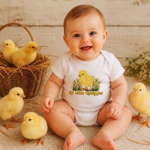 a baby wearing a 'my little chickadee' romper