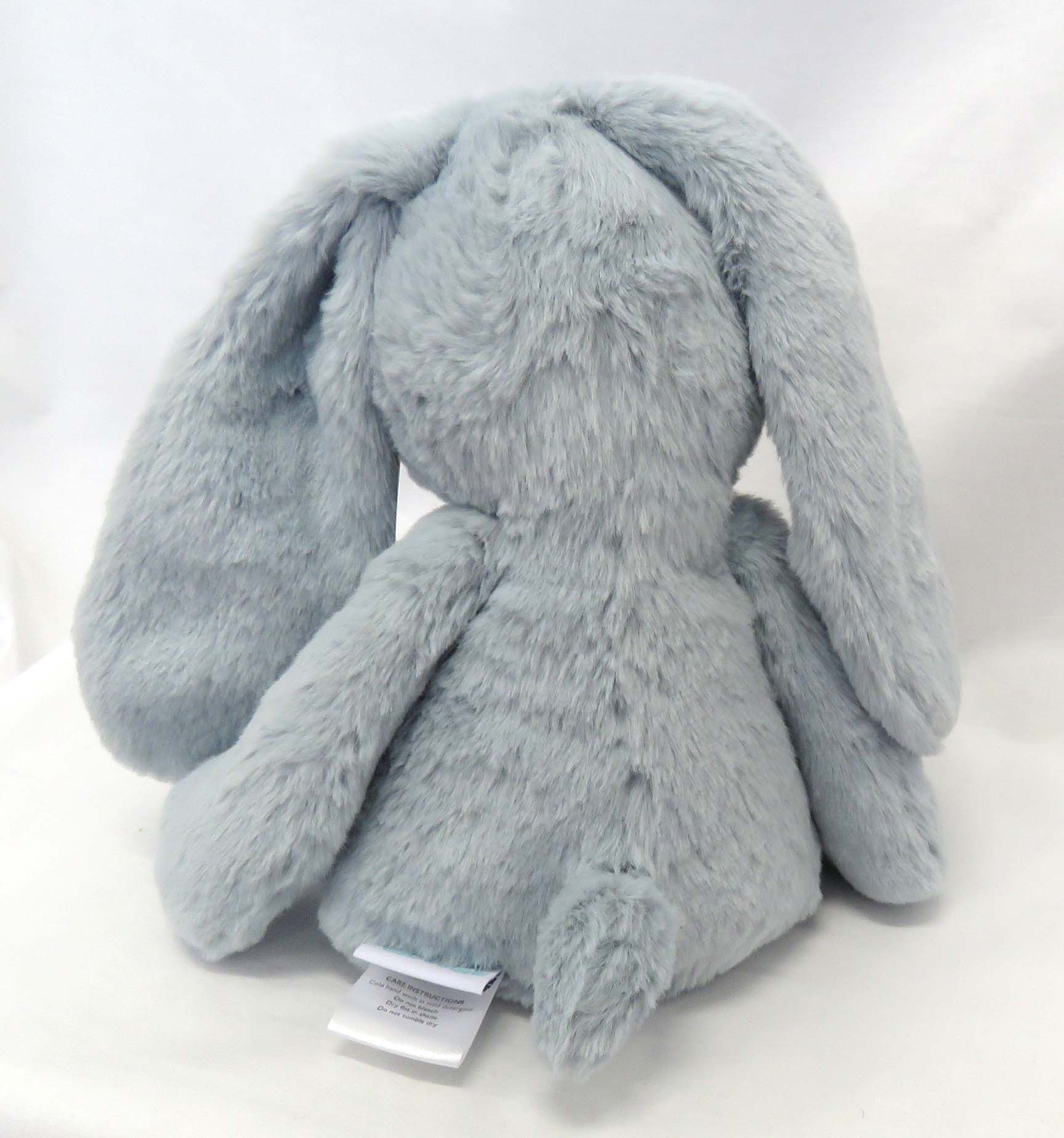 small pale blue bunny back view