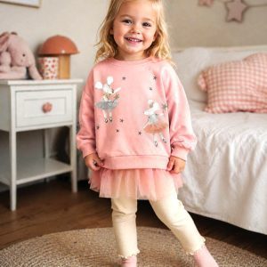 cute little girl wearing a kids on trend little mouse outfit