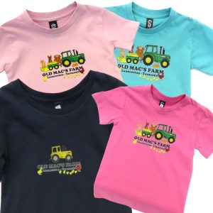 Four t-shirts with old macfarm shop logos on the front