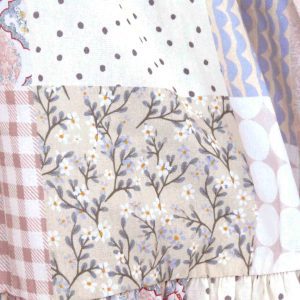 kids on trend patchwork printed dress in pink and brown detail of patches 2