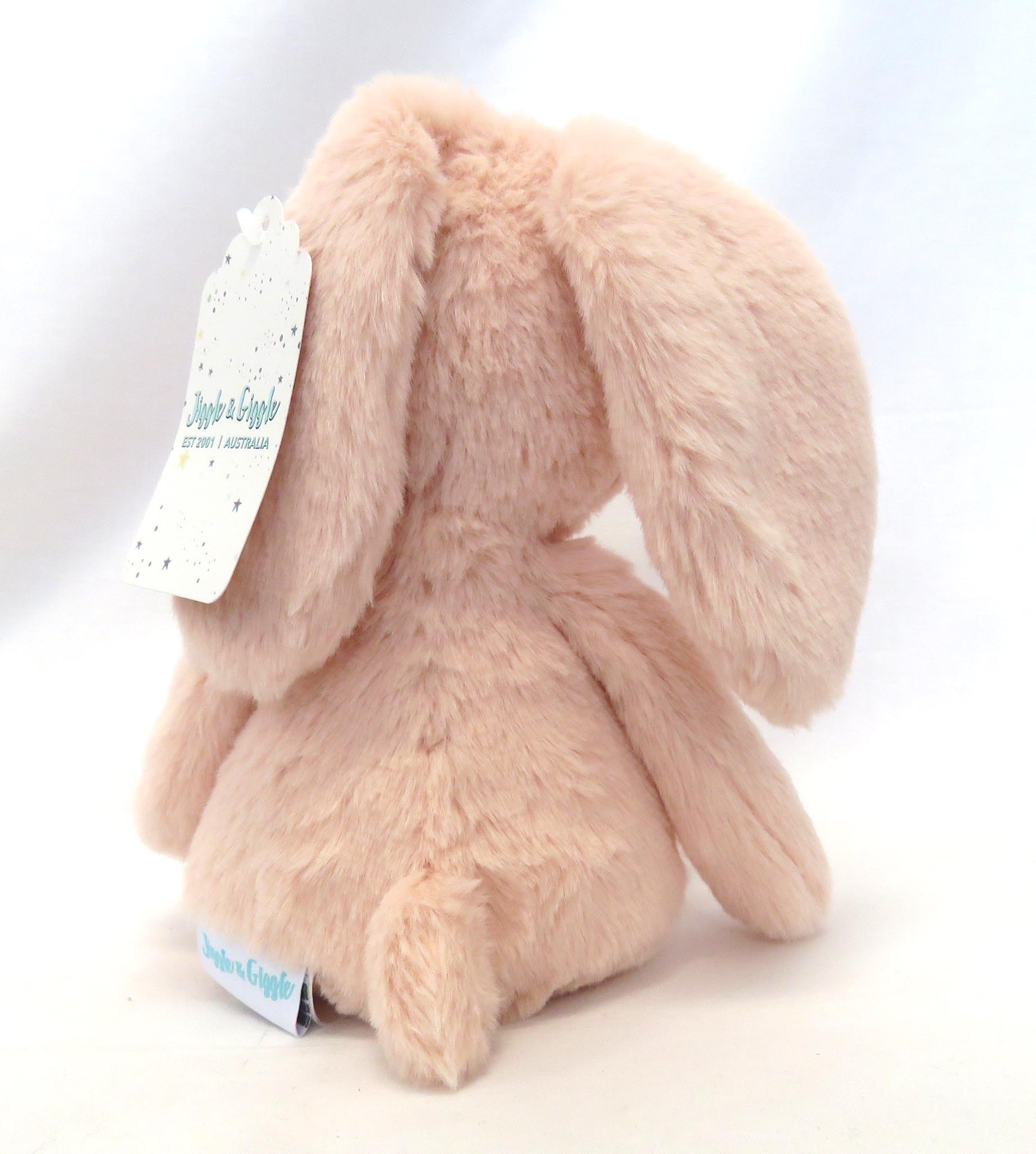 small peach pink bunny back view