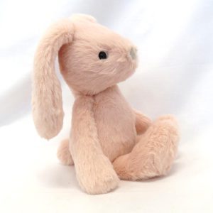 small peach pink bunny side view