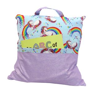 reading pillow - rainbows and unicorns - front view with abc book