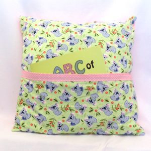 reading pillow - koalas - front view with abc book