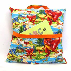 reading pillow - dinosaurs - front view with abc book