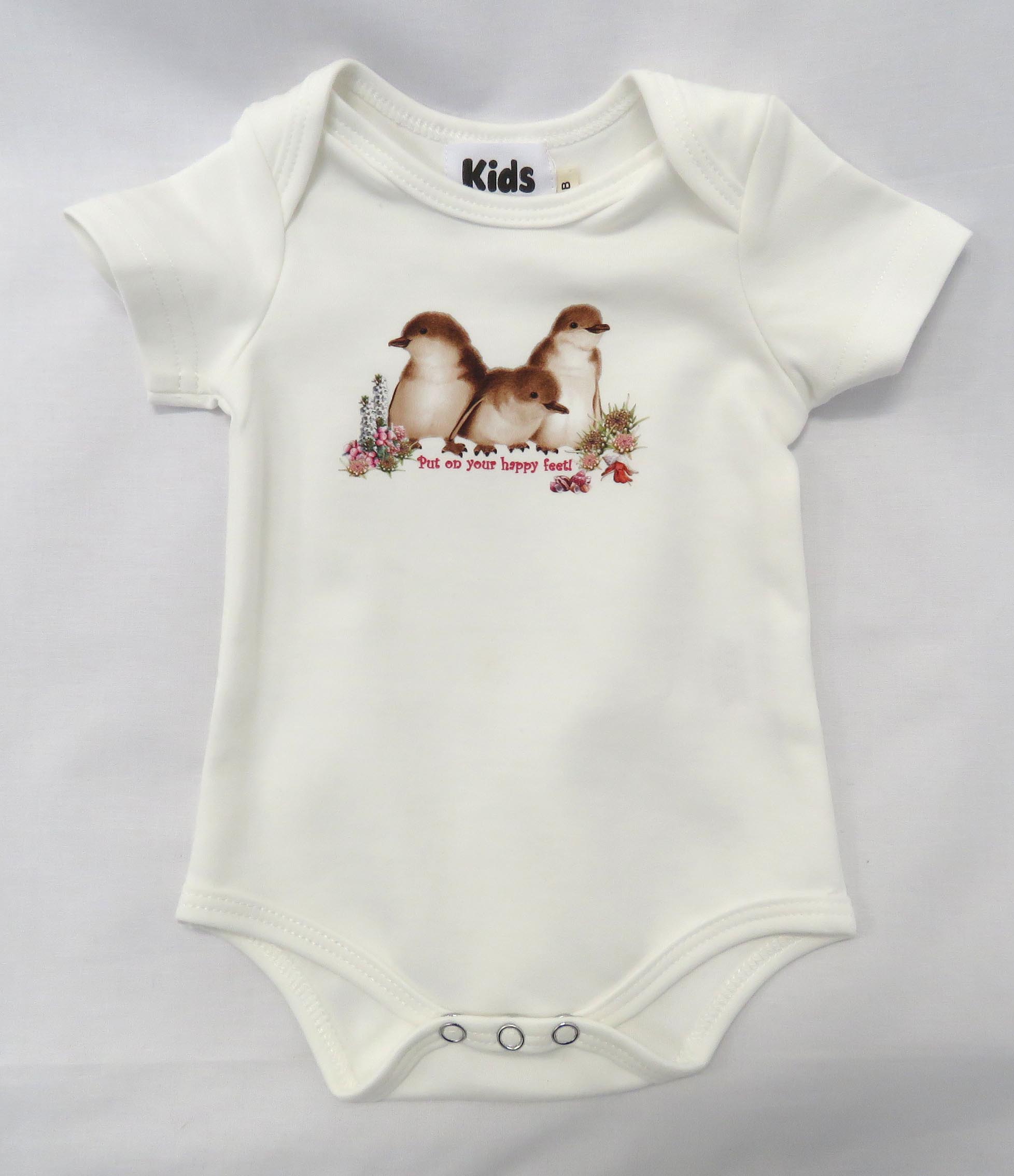 white baby romper with fariy penguin print text reads - put on your happy feet