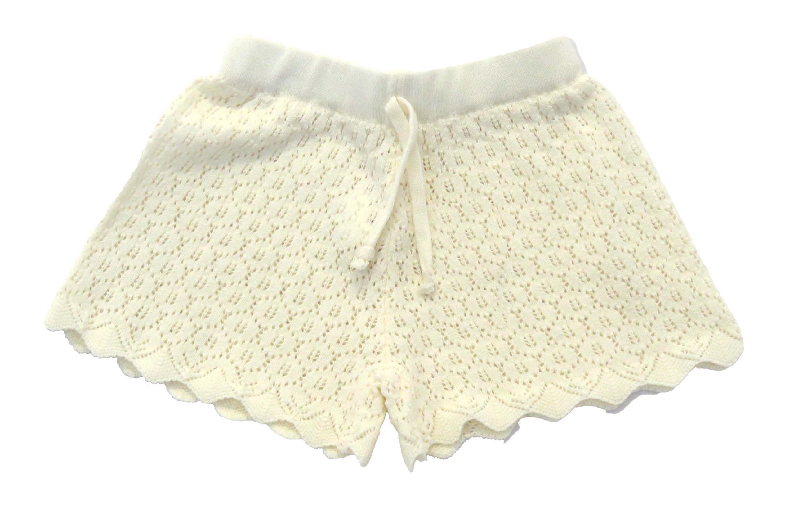 kids on trend cream coloured crotcheted girls shorts front view