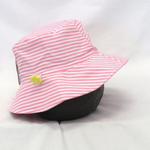 pink and white striped sunhat for babies side view