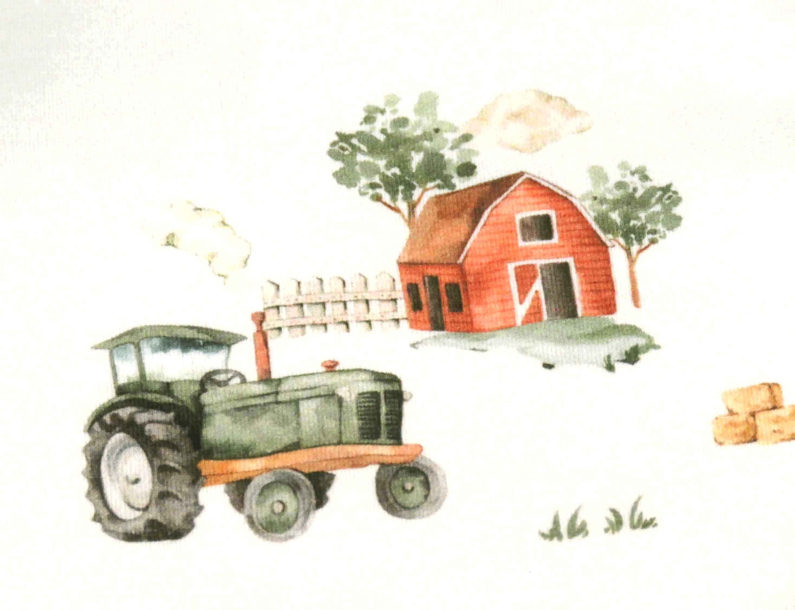 detail of snuggle hunny tshirt showing a tractor and a barn