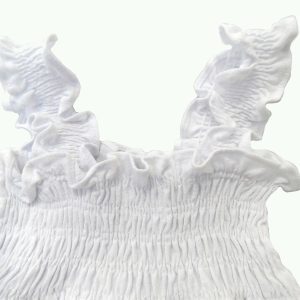 kids on trend frilly white coloured dress close up of gathered bodice and straps