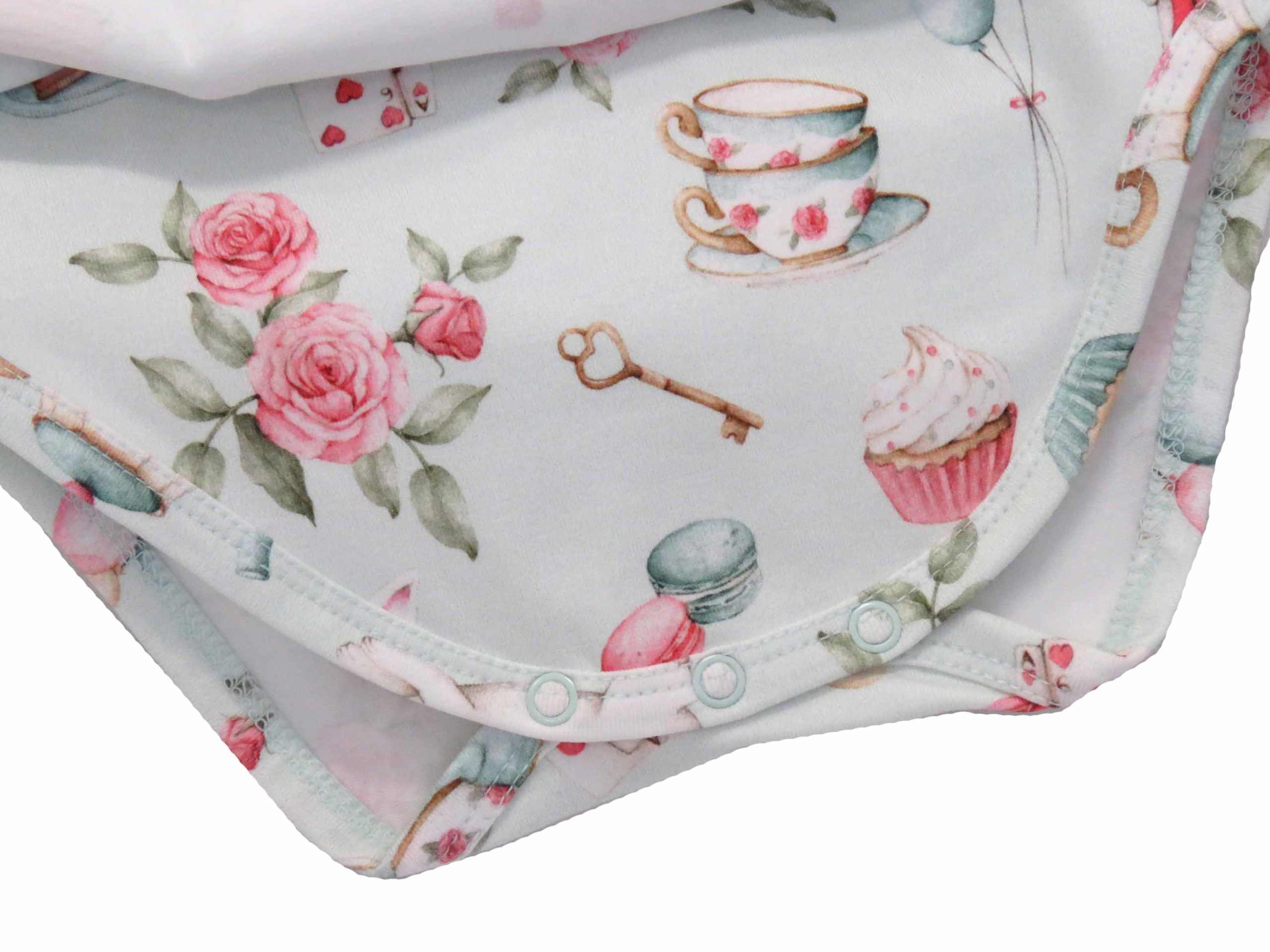 Snuggle Hunny pale green dress for toddlers - white rabbit design - close up of buttoned under garment