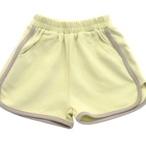 kids on trend yellow girls sports shorts front view